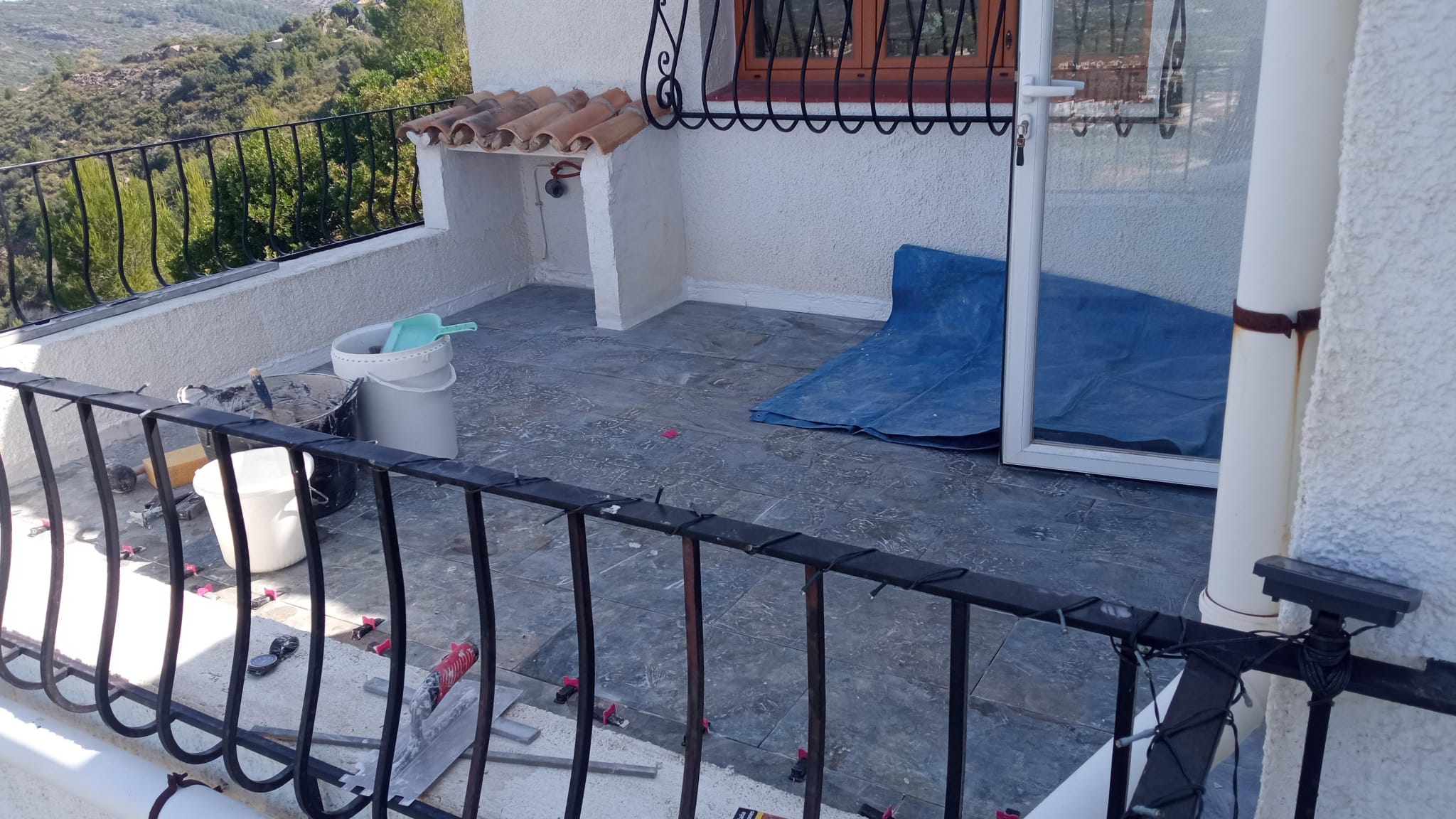 Balcony tiling in progress