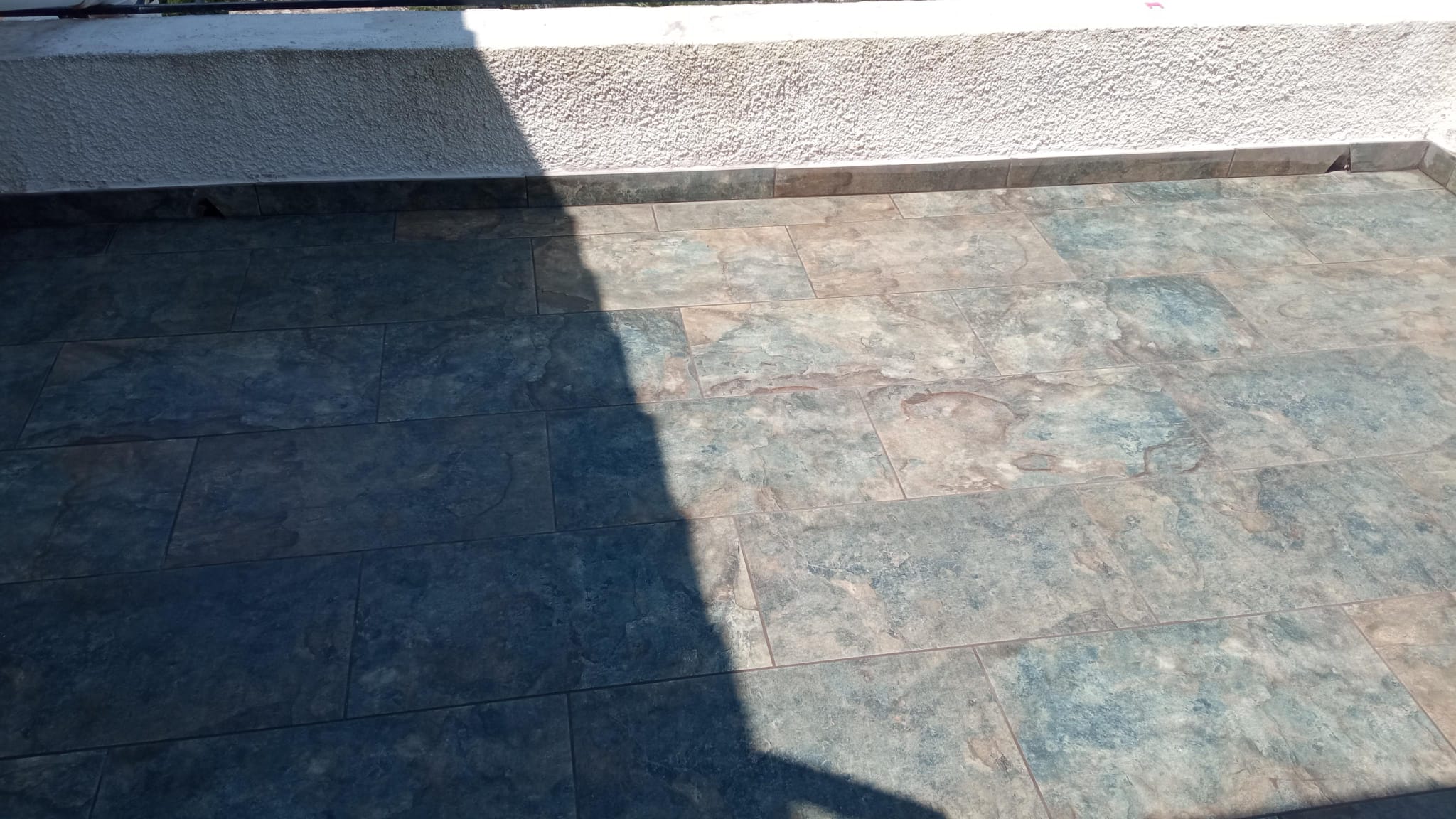 Completed terrace tiling with slate tiles